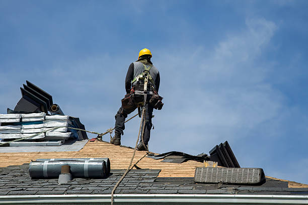 Professional Roofing technician working in Moorhead, IA